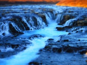 The frosty blue sight of Bruarfoss waterfall in south Iceland takes a bit of time to find but is a spectacular site and worth the trek