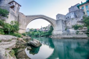 The bridge Stari Most in Mostar arching over the river Neretva