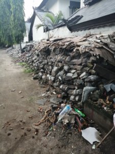 Piled up bricks and concrete left over from damaged buildings on Gili Trawangan as a result of two large earthquakes